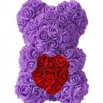 Αρκουδάκι από Τεχνητά Τριαντάφυλλα σε Συσκευασία Δώρου με Φιόγκο 25cm - Αρκούδι που κρατάει Καρδούλα Rose Bear - Δώρο Αγίου Βαλεντίνου Μώβ
