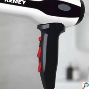 KEMEI Επαγγελματικό Πιστολάκι Μαλλιών 2000W με Λειτουργία Thermoprotect Λευκό/Μαύρο